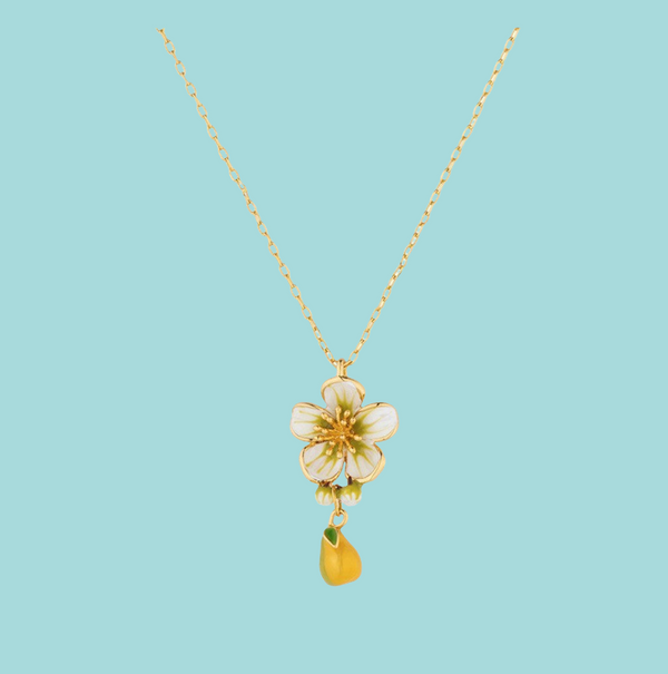 a necklace with a flower on a chain