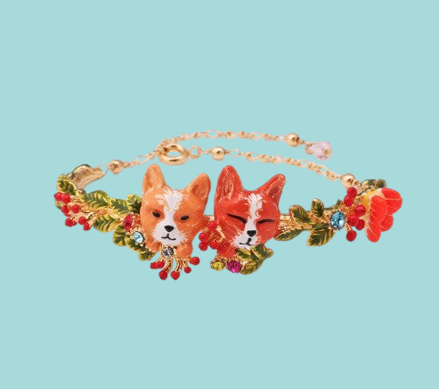 a bracelet with two dogs on it